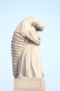 Low angle view of statue against clear sky