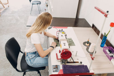 High angle view of woman using mobile phone