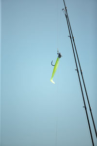 Low angle view of kite against clear sky