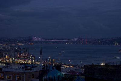 High angle view of suspension bridge at night