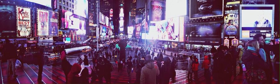 Crowd in city at night