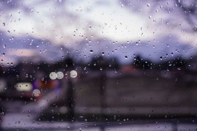 Close-up of water drops on glass