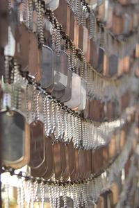 Full frame shot of pendants for sale at market