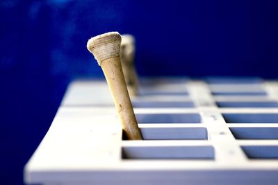 Close-up of piano keys on table
