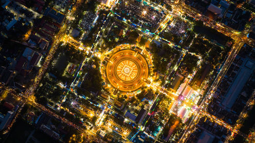 High angle view of illuminated buildings in city at night