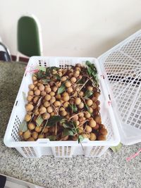 High angle view of vegetables in container on table