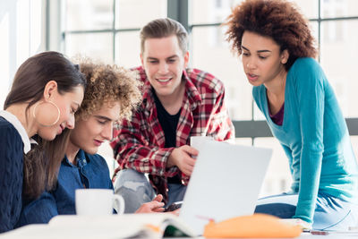 Students studying on table