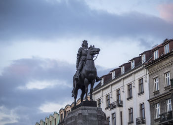 Low angle view of statue against sky