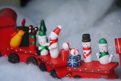 Close-up of toys on table during winter
