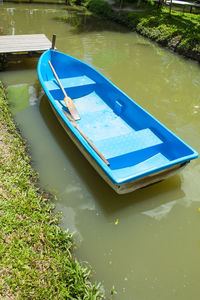 High angle view of boat floating on lake