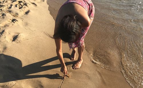 High angle view of girl on beach