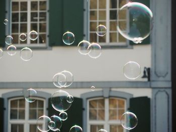 Close-up of bubbles against building