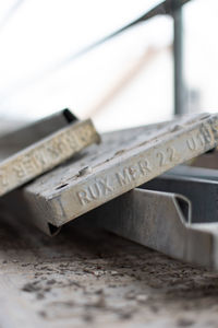 Close-up of text on wood