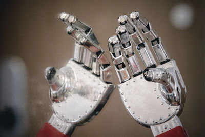 Close-up of metal robot hands