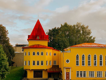 Multi colored buildings against sky