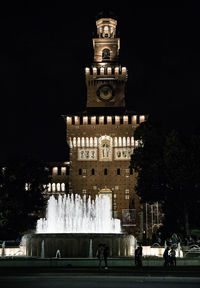View of clock tower at night