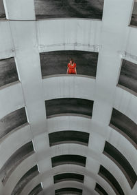 High angle view woman standing in building