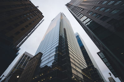 Low angle view of modern buildings in city