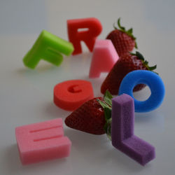 Close-up of multi colored pencils on table