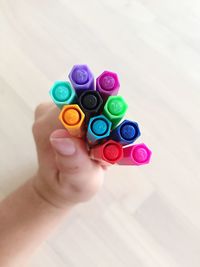 High angle view of woman wearing colorful balls