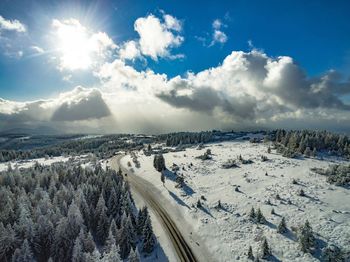 Panoramic view of landscape against sky during winter