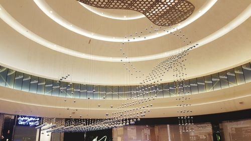 Low angle view of illuminated ceiling