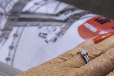 Close-up of hand holding metal