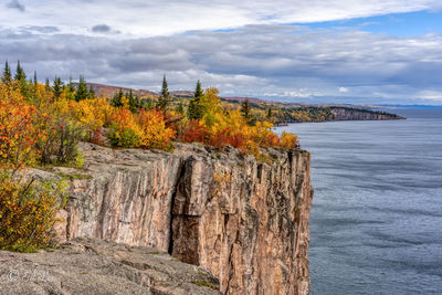 Scenic view of sea against sky during autumn