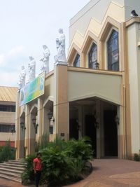 Exterior of building by street against sky