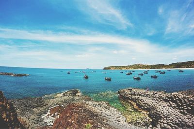 Scenic view of sea against cloudy sky