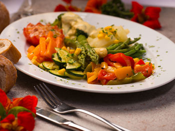 Close-up of salad served in plate on table