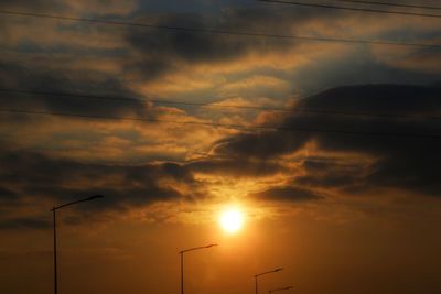 Low angle view of silhouette mountain against sky during sunset