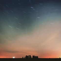 Low angle view of built structure against sky at night