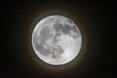 Low angle view of moon against sky at night