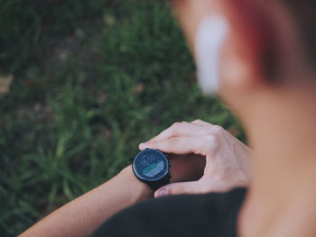 Cropped image of person wearing smart watch