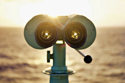 Binoculars pointing on sea