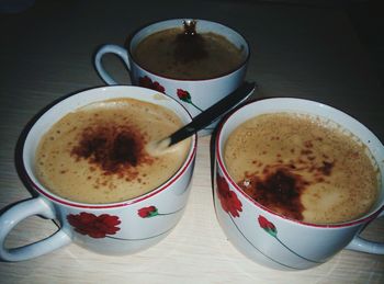 Close-up of coffee cup on table