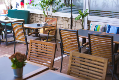 Empty chairs and table in restaurant