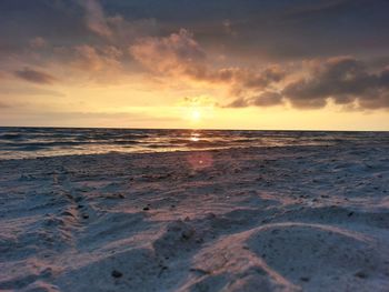 Scenic view of sea at sunset