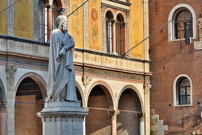 Low angle view of old building in city