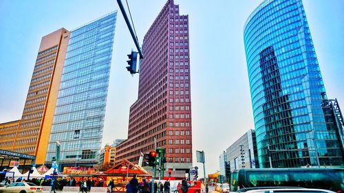 Low angle view of skyscrapers against clear sky