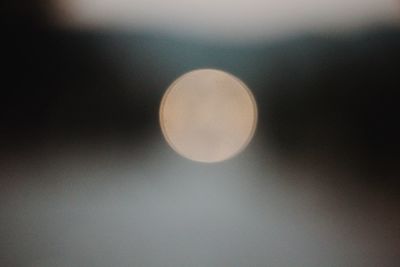 Low angle view of moon against sky at night