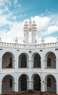 View of historical building against cloudy sky