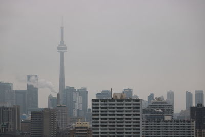 View of skyscrapers in city against sky