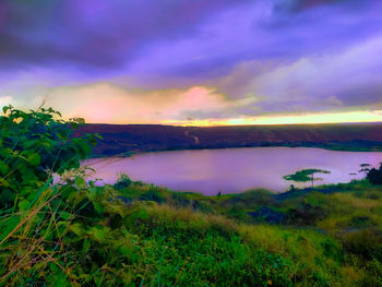 Scenic view of landscape against sky during sunset