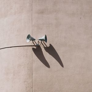 Close-up of loudspeakers on wall