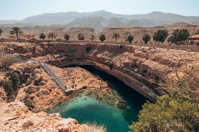 Arch bridge over mountains