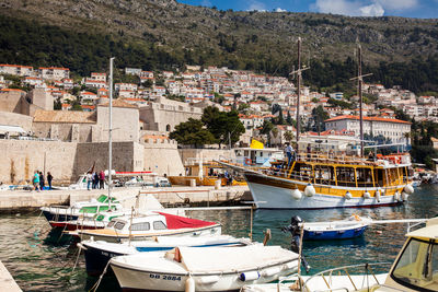 View of boats moored at harbor