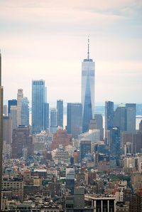 Modern buildings in city against sky