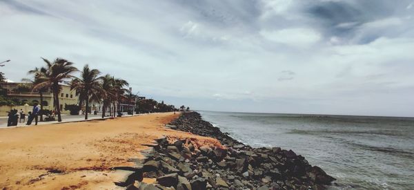 Scenic view of beach against sky